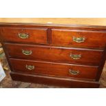 Edwardian chest of drawers, the rectangular top above two short and two long drawers, 106cm wide