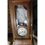 Mahogany wall clock, with a silvered dial, three train movement