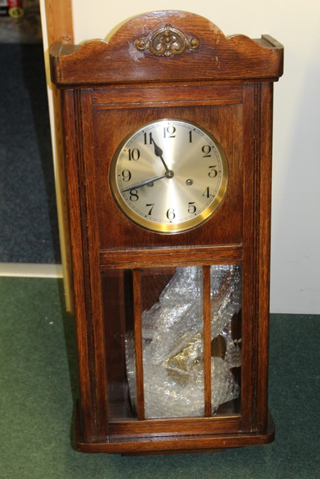 Oak cased wall clock