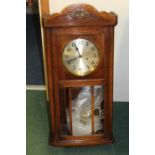 Oak cased wall clock