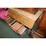 Victorian pine Pembroke table, together with two stools, (3)