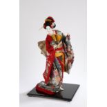 Japanese geisha figure, with red and blue robes, 54cm high