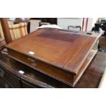 Victorian mahogany table top desk, with slopping fall, 58cm diameter