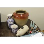 Pottery and porcelain, to include a collection of Wade Whimsies, stoneware jars, two vases, a