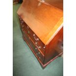 George III style mahogany bureau, the rectangular top above a slopping fall and four long drawers,
