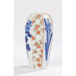 Japanese porcelain vase, with angled panels of blue flower and leaf design and colourful flower