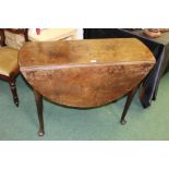George III mahogany drop leaf table, with a rounded drop leaf top above tapering legs and pad feet