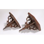 Pair of Victorian corner brackets, carved with Gothic scrolls, 20cm high, (2)