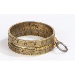 18th Century brass ring sundial, with an adjustable central marker and outer months and inner scale,