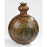 Middle Eastern painted metal water flask, the bulbous body with stylised foliate decoration, 40cm