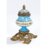 19th Century enamel and gilt metal inkwell, the foliate decoration on blue ground with gilt metal