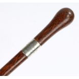 Victorian silver mounted palmwood walking stick, with a rounded top above a silver collar with the