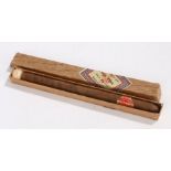 Cigar, within the case, label Garantizados por Flor Fina extra Especial Excepionales, the cigar 24cm