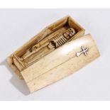 Bone miniature coffin, the white metal cross applied to the lid of the coffin, the interior with a