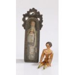 Unusual 19th Century reliquary case, the white metal case enclosing a model of a nun, 67mm high,