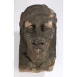 18th Century grotesque head, of a figure with head ware, 29cm high