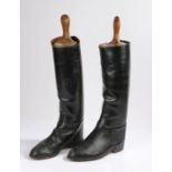 Pair of black leather riding boots and trees with retailers name Maxwell Dover St London