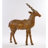 Persian antelope, of large proportions, in a sand yellow and curled horns, 99cm high