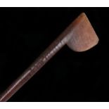 19th Century Tewhatewha club, the axe type head above a tapering shaft and carved three quarters way