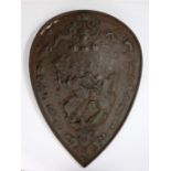 19th Century cast iron decorative shield, the pear shaped shield with figures around the edge and