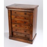 Victorian walnut collectors cabinet, in the form of a Wellington chest, with a rectangular top above