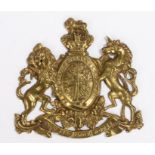 Victorian brass coat of arms, 15cm diameter