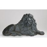 Large 19th Century cast iron lion, the reclining lion facing forward and a bracket to the rear, 70cm