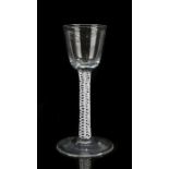 George III air twist wine glass, the tapering bowl above an air twist stem and arched foot, 15cm