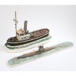 Painted model of a U boat U77, on a sea effect base, 71cm wide, painted model of a fishing boat on a