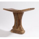 African Turkana headrest, Kenya, with a slightly arched top above a column with strap and dome base,