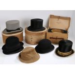Bowler and top hats, to include Dunn & Co. bowler hat and top hat in boxes, top hat with gilt rim