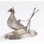 White metal novelty table lighter, as a game bird and two sporting guns, 13cm long