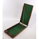 Victorian Bagatelle mahogany case, the folding board together with a cue