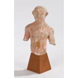 Hellenistic pottery figure, 300-200 B.C. of an athlete, 9.5cm high excluding the stand