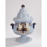 19th Century pottery Leeches jar, the finial top above a pierced lid, the base with a blue and