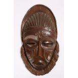 African copper mask, the oversized mask with slit eyes and pointed teeth, 53cm high
