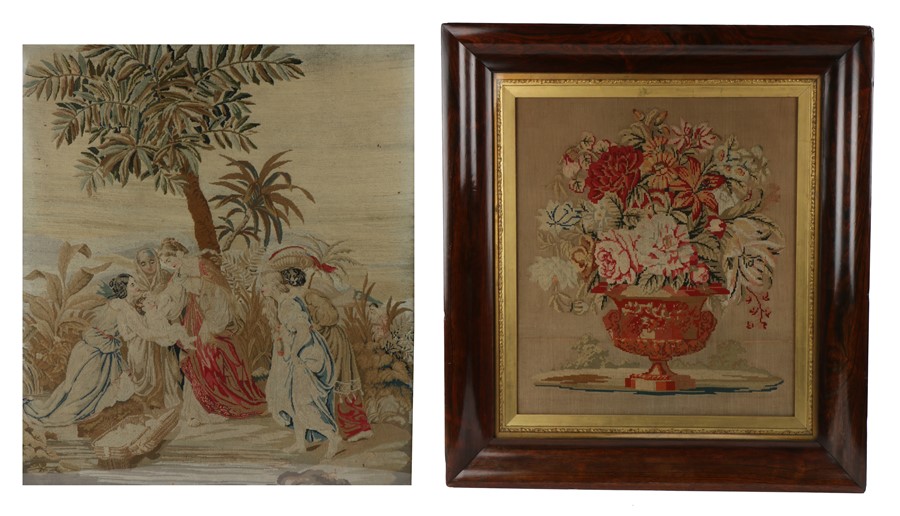 19th Century wool work picture, of an urn and blooming flowers housed within a rosewood frame,