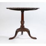 George III style occasional table, the pie crust top above a turned column and acanthus leaf