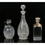 19th Century glass, to include a tall decanter with cut glass and trailing vine leaves, 32cm high,