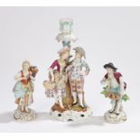 Sitzendorf porcelain pair of figures, with a male and female figure selling flowers, together with a