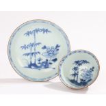 Nanking Cargo, a tea bowl and saucer, with bamboo and peony decoration, the bowl 7.5cm wide, (2)