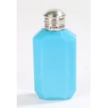 Silver mounted turquoise glass scent bottle, with a hinged lid and canted edges to the bottle,