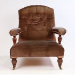 Victorian deep armchair, the arched stuff over button back above a stuff over seat and padded arms