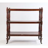 Victorian mahogany buffet, the three tiers with rectangular shelves united by turned columns, 83cm x