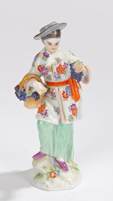 19th Century Meissen porcelain figure, after Frederich Elias Meyer, of a figure selling grapes,