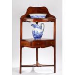 19th Century mahogany washstand with a gallery back above a frieze drawer to the shelf uniting the