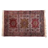 Anatolian carpet, the cream ground with lozenge pattern centre and multiple borders, wool on cotton,