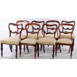 Set of six Victorian mahogany balloon back dining chairs, with pierced splat backs, upholstered