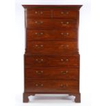 George III mahogany chest on chest, the concave cornice above two short and six long drawers