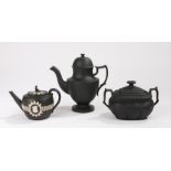 19th Century black basalt pottery, to include a coffee pot with a shallow geometric design, a